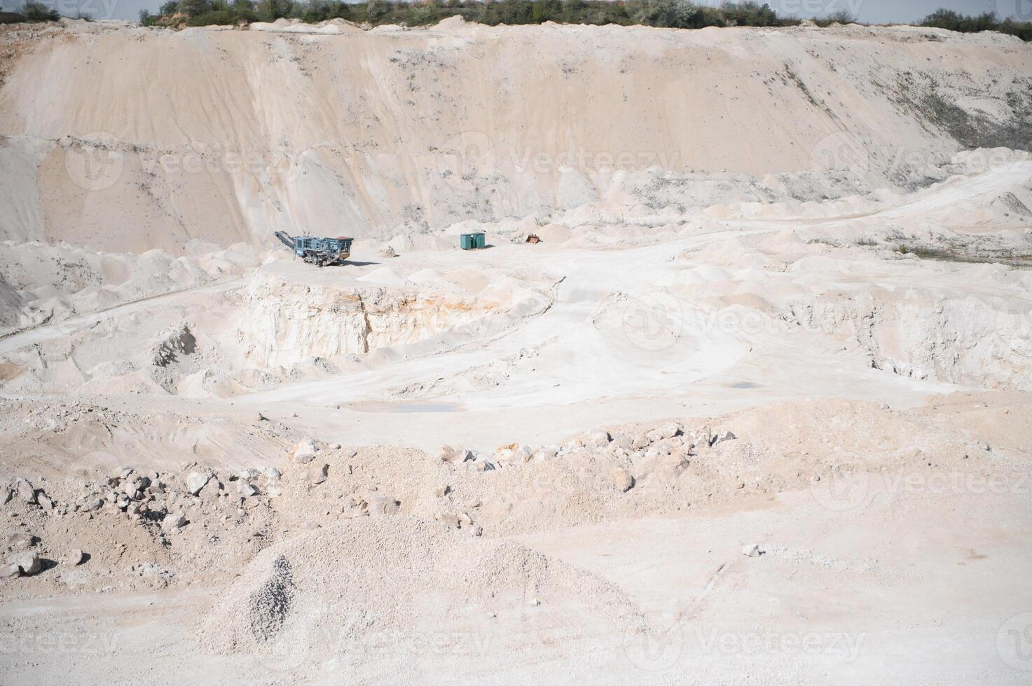 sand quarry, in the photo, a quarry for the extraction of sand against a blue sky photo