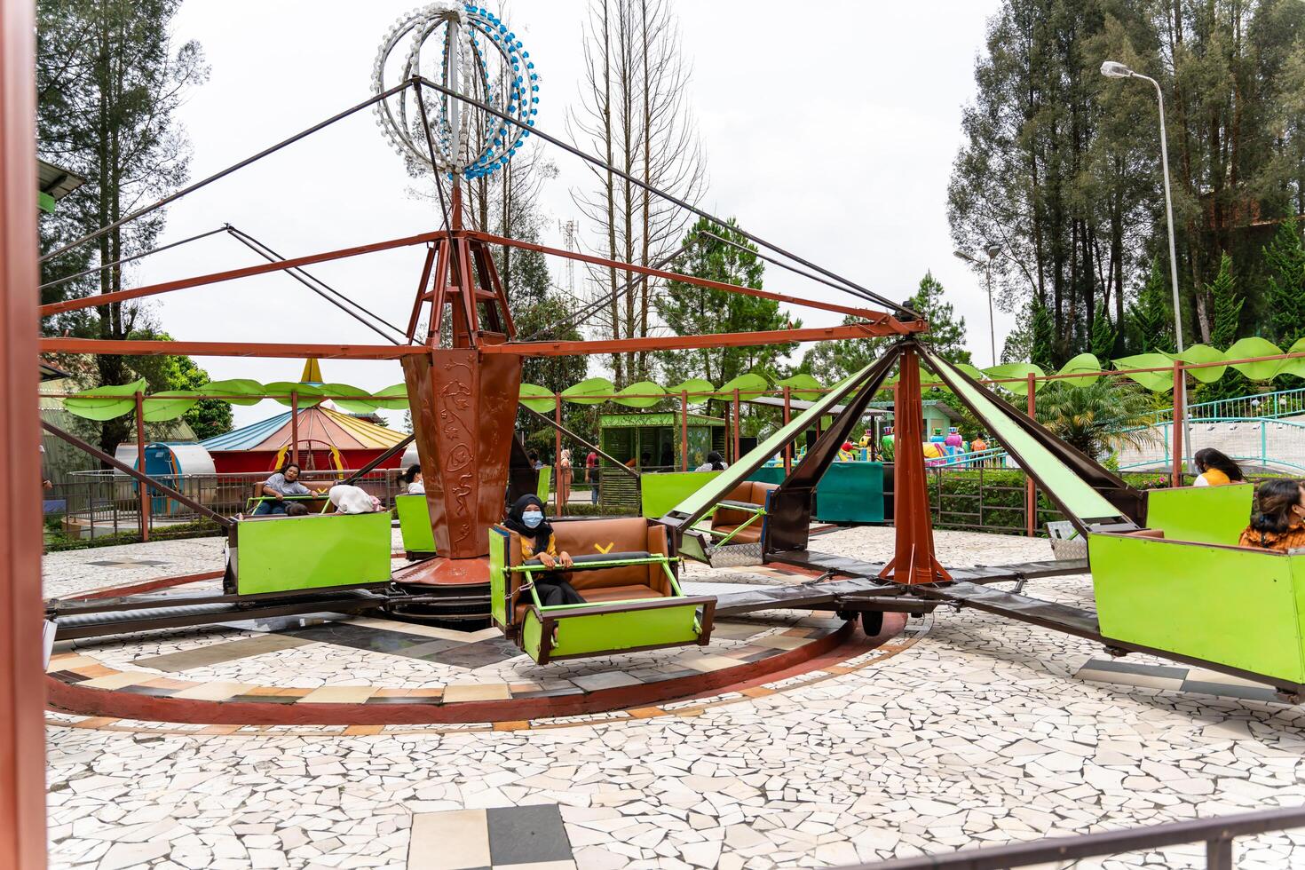 Berastagi, North Sumatra, Indonesia - September, 26 2021. Tourist are travelling playing and recreation at Mikie Holiday Resort or Mikie Funland Berastagi - North Sumatra photo