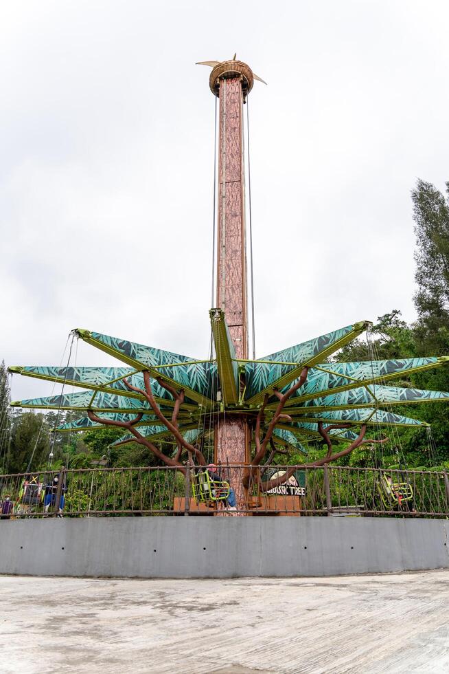 Berastagi, North Sumatra, Indonesia - September, 26 2021. Tourist are travelling playing and recreation at Mikie Holiday Resort or Mikie Funland Berastagi - North Sumatra photo