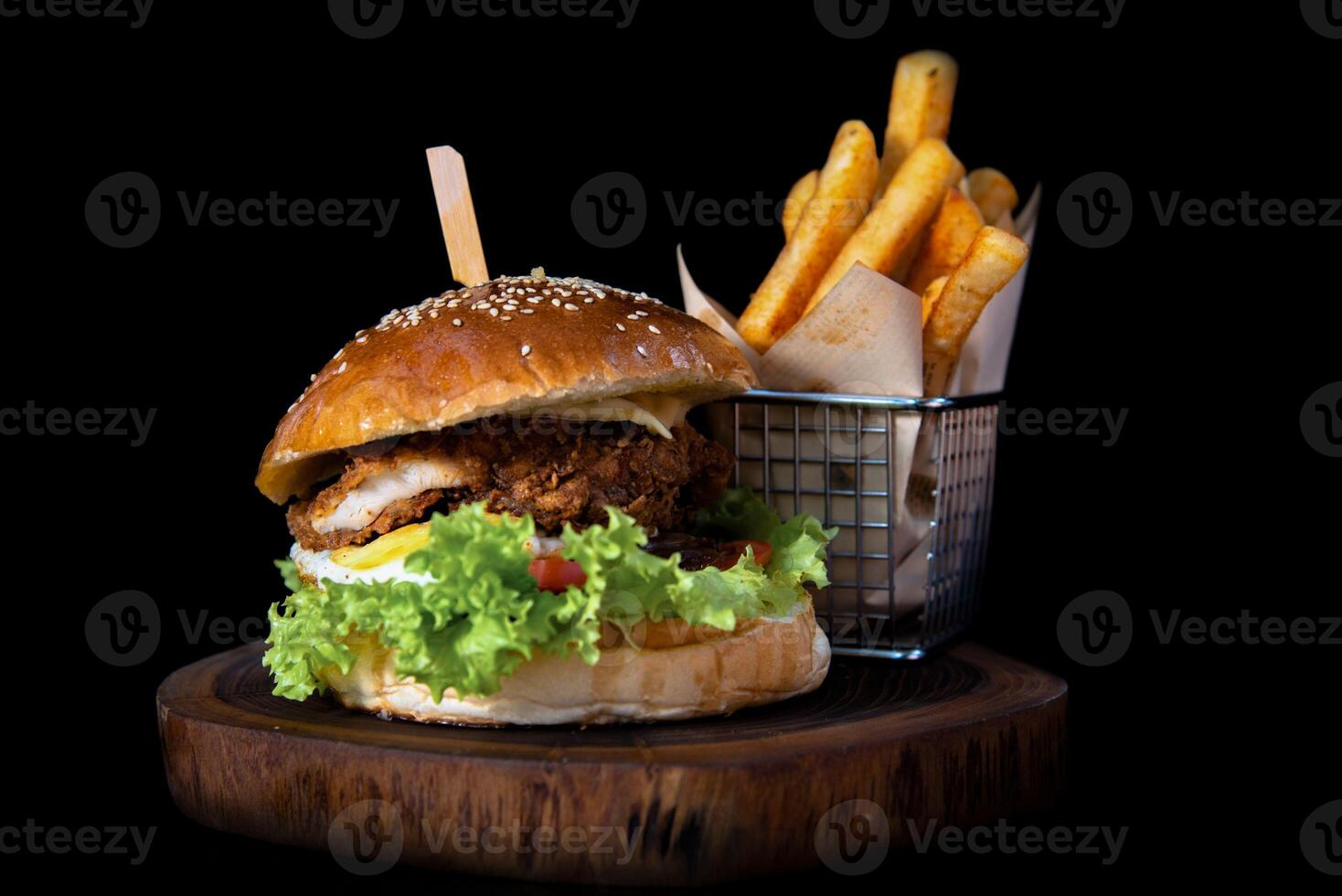 Burger with lots of vegetable and cheese wallpaper photo