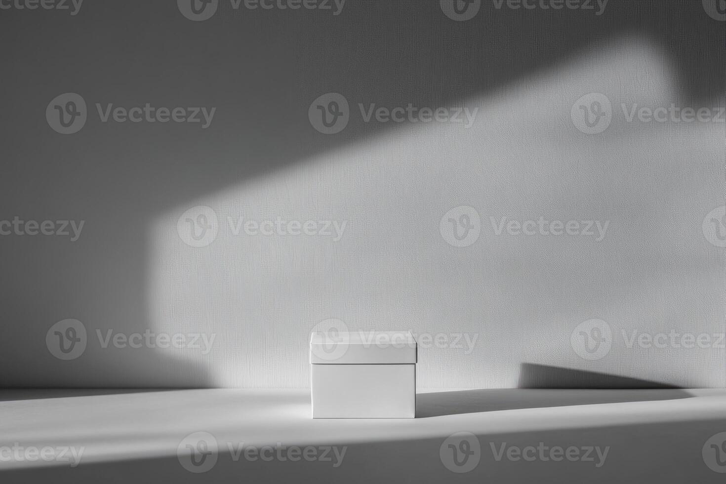 White Box on White Surface with Light and Shadow photo