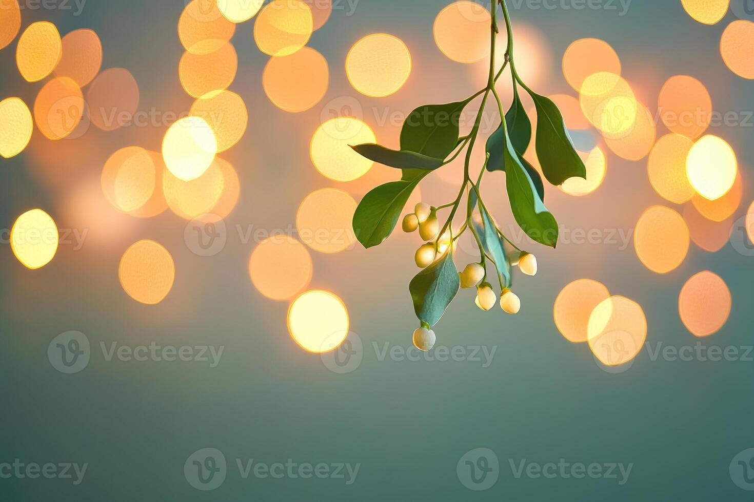 Mistletoe Branch with White Berries and Golden Bokeh Lights photo