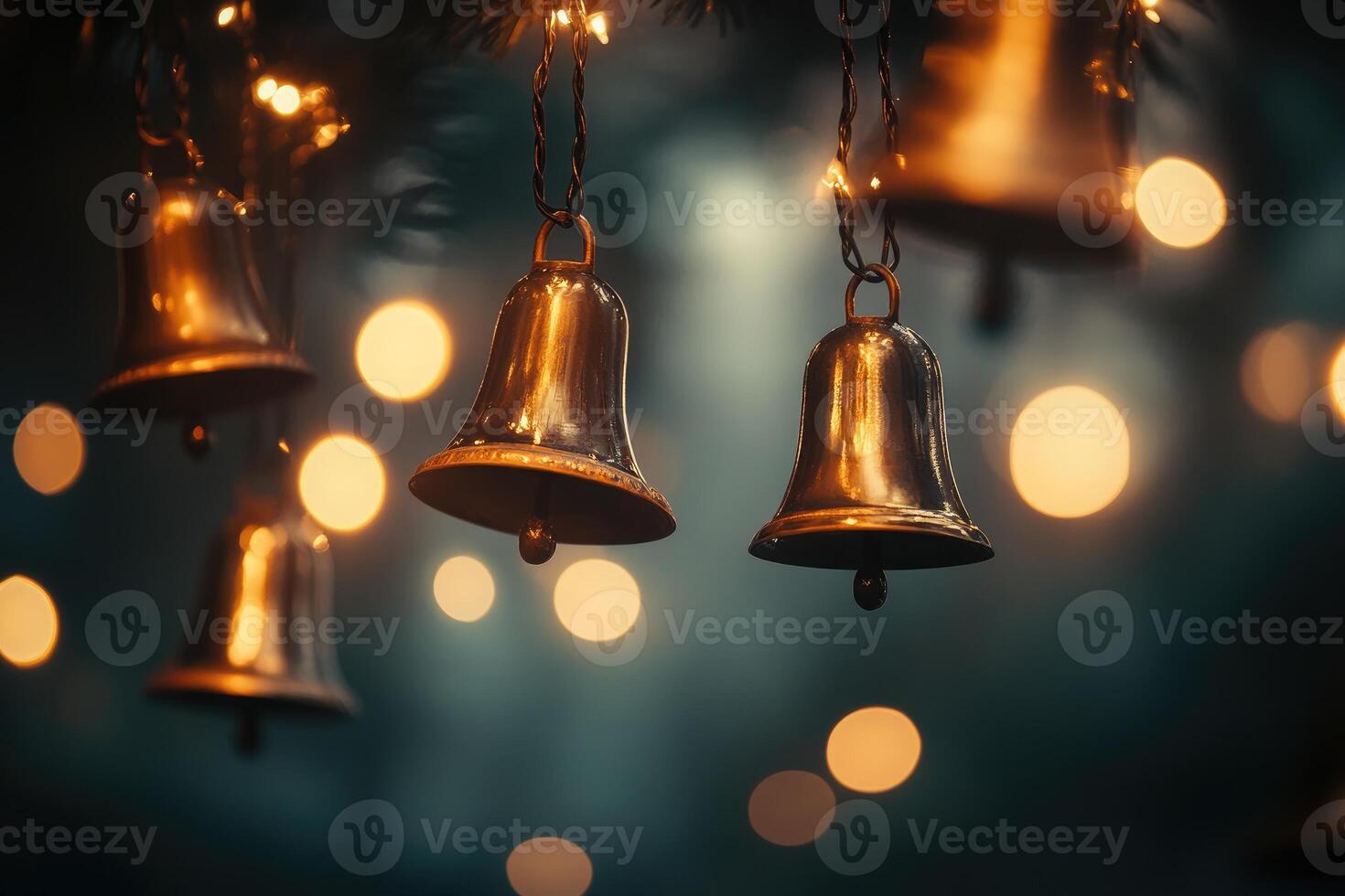 Golden Bells Hanging from a Twinkling Light String photo