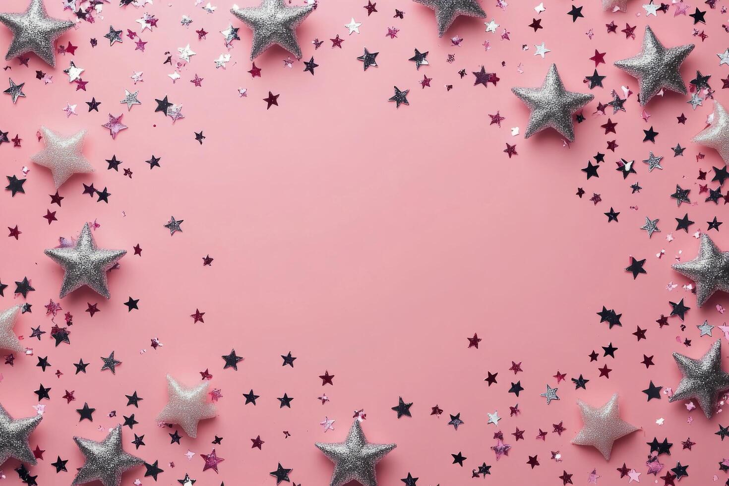 Decorative silver stars arranged in a circular pattern on a pink background for festive celebrations photo