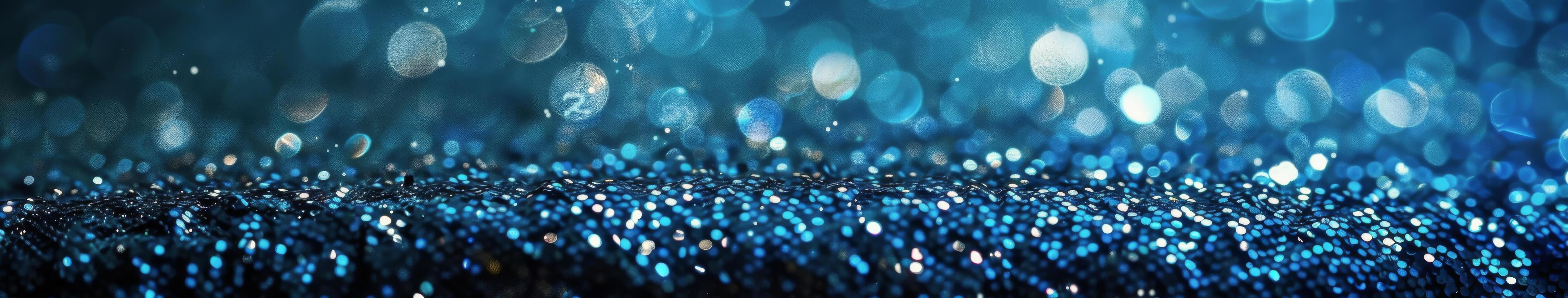 Abstract Blue Glitter Background With Bokeh Lights photo