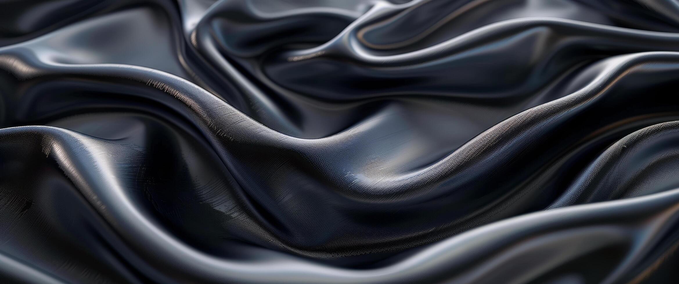 Closeup of Draped Black Satin Fabric With Smooth, Reflective Surface photo