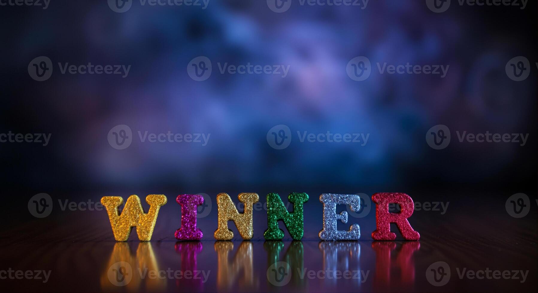 Colorful letters spelling winner celebration with sparkling design on reflective surface photo