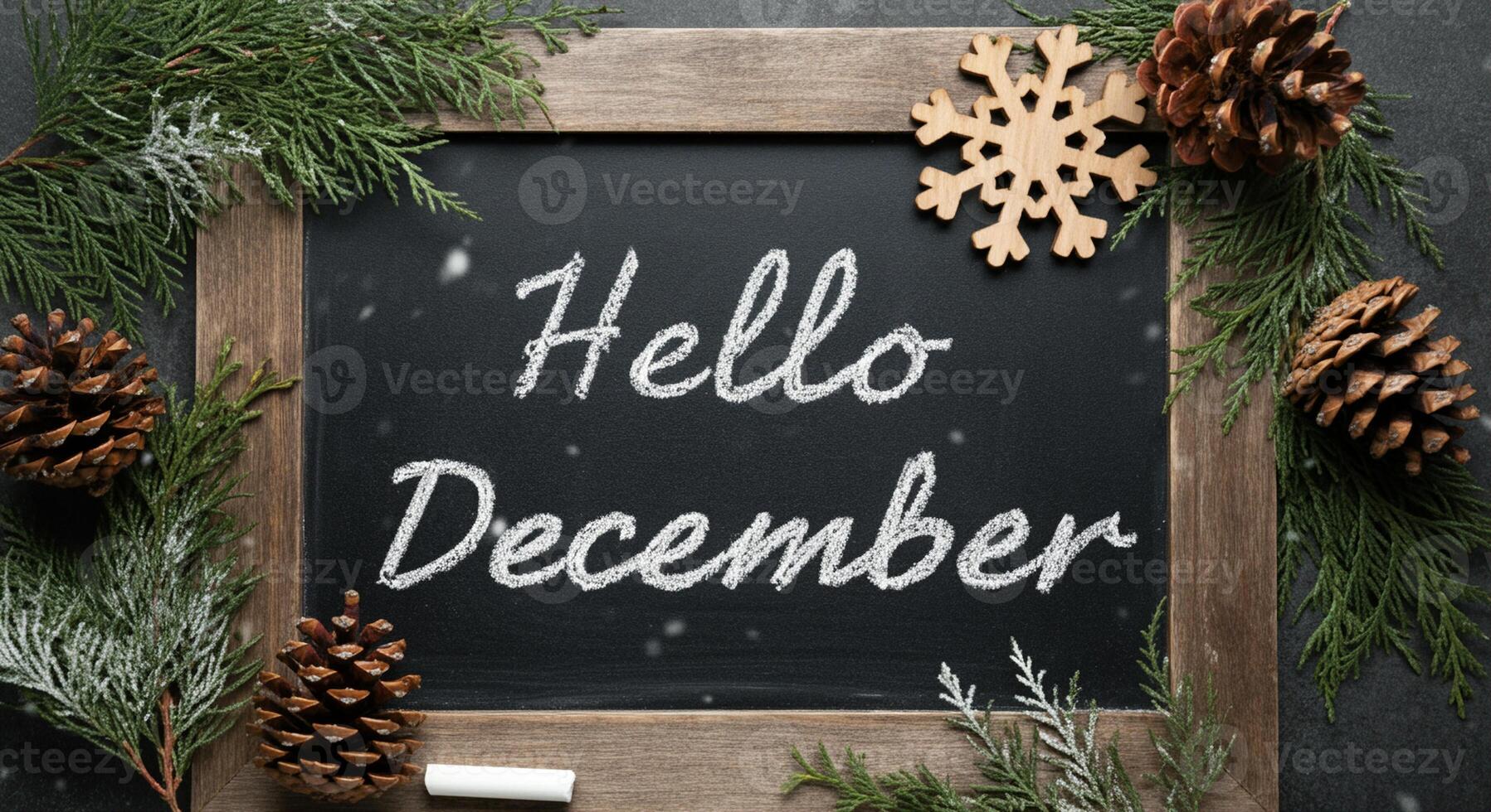 Chalkboard Hello December seasonal greeting with pinecones and snowflakes photo