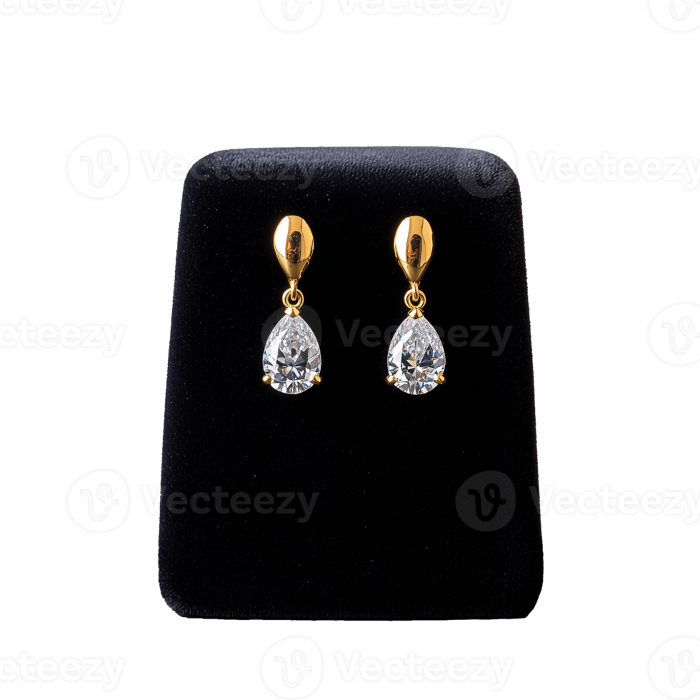 Elegant gold and diamond teardrop earrings on a black display stand on a transparent background png