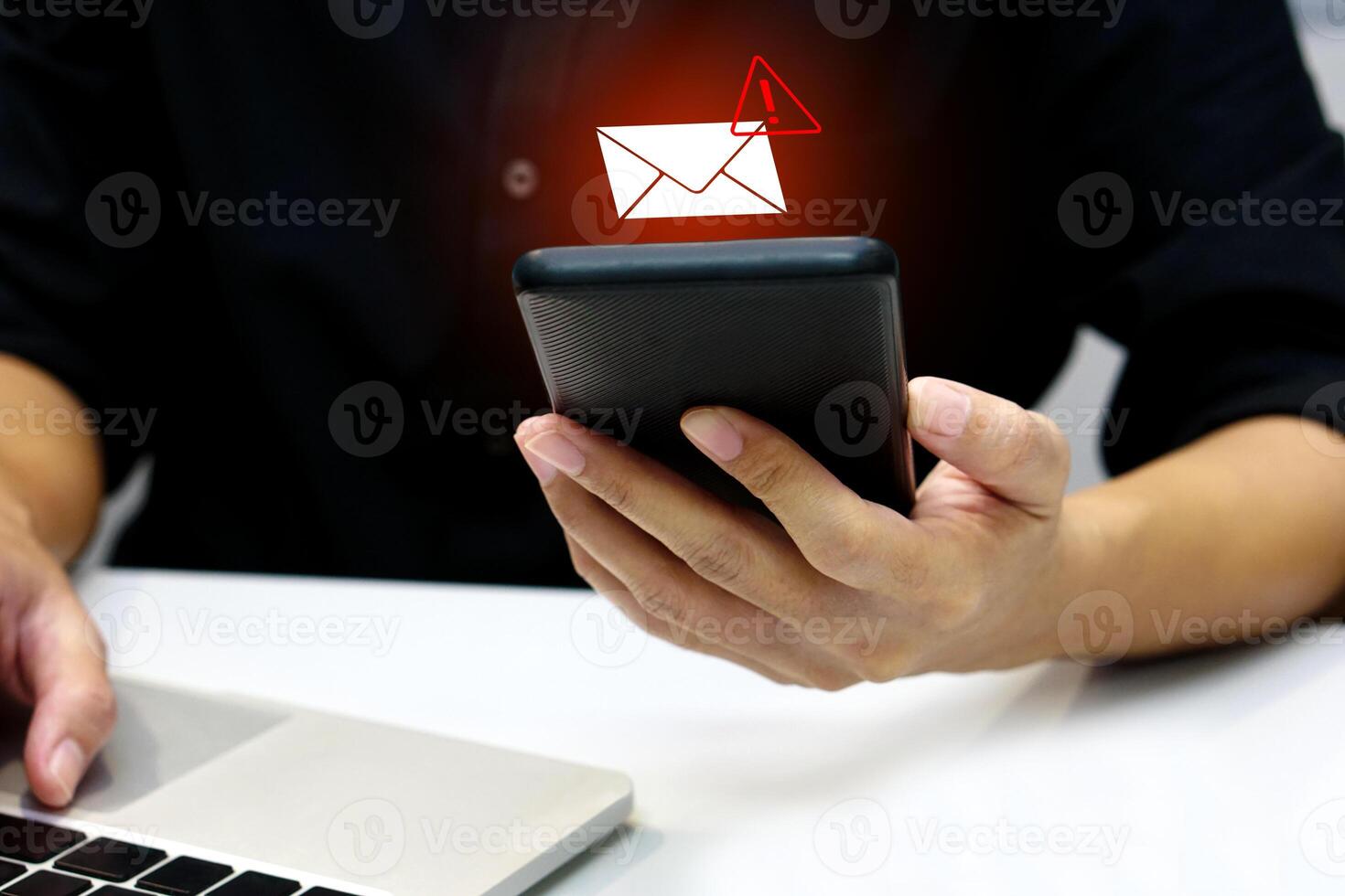 Person using smartphone with virtual screen of spam virus email inbox alerts, warning alerts. Email spam, spam messages and email security protection concept. photo