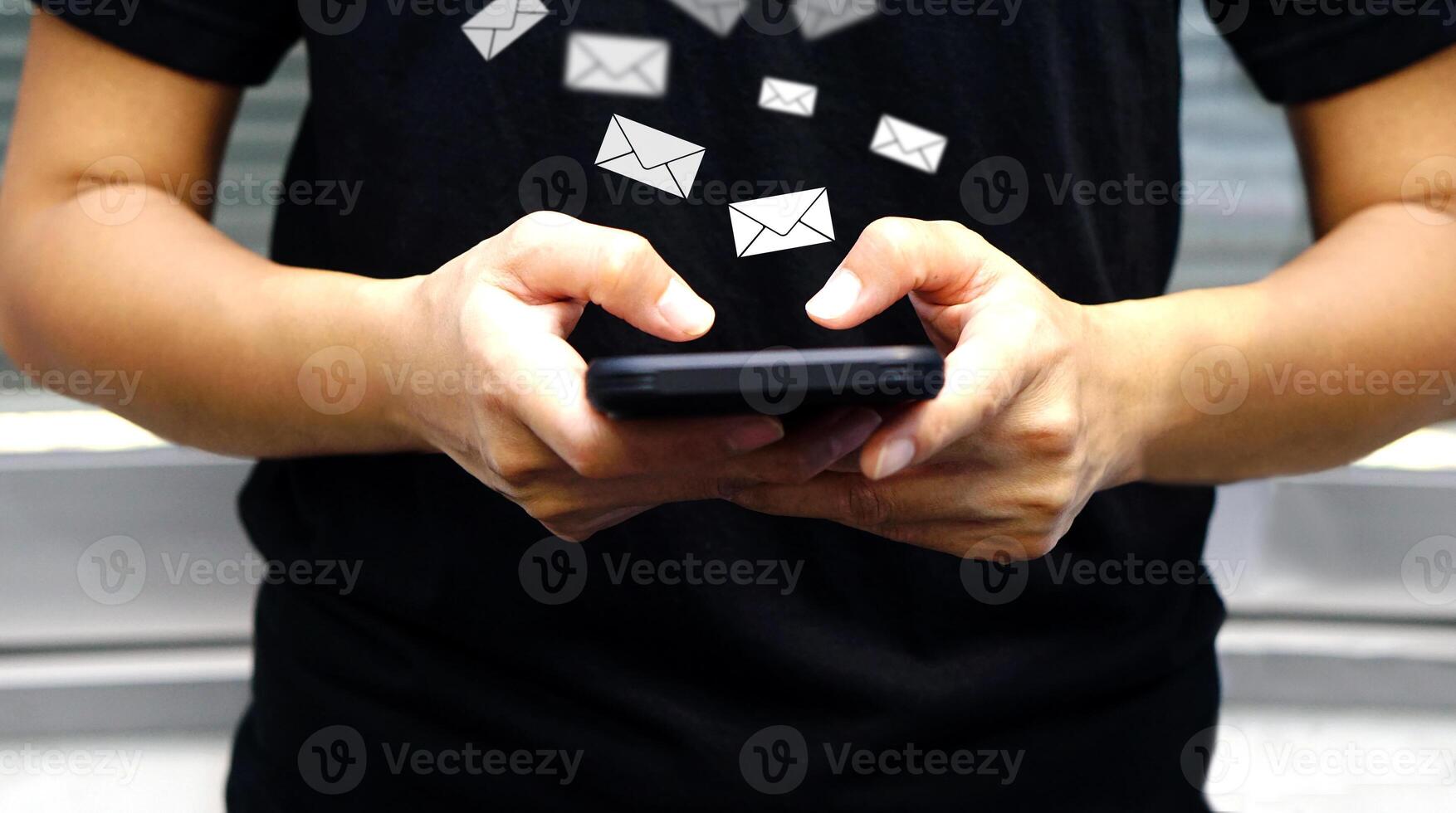 Businessman sending large amount of SMS messages on smartphone, show message box virtual. Bulk messaging, communication online, software technology and the virtual assistant on communication internet. photo