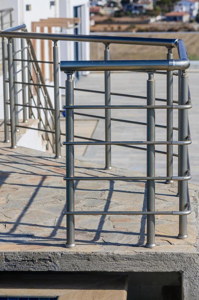 Modern Stainless Steel Railing Design Enhancing Outdoor Space With Scenic Views During Daylight photo