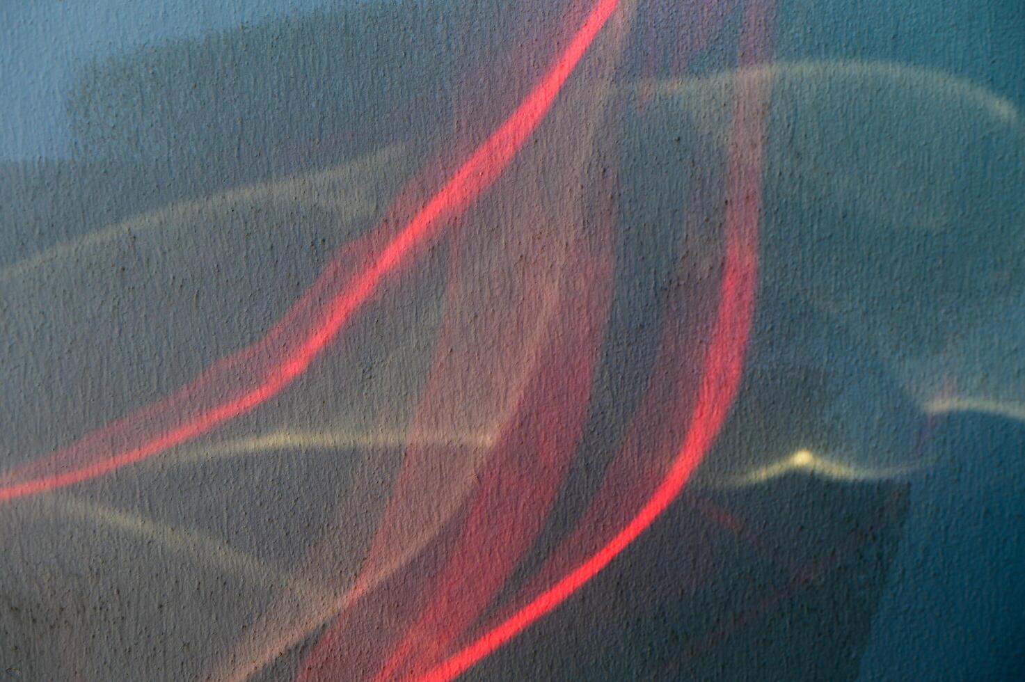 Abstract Light Patterns Dance Across a Textured Surface, Blending Colors in a Mesmerizing Display During Twilight Hours photo
