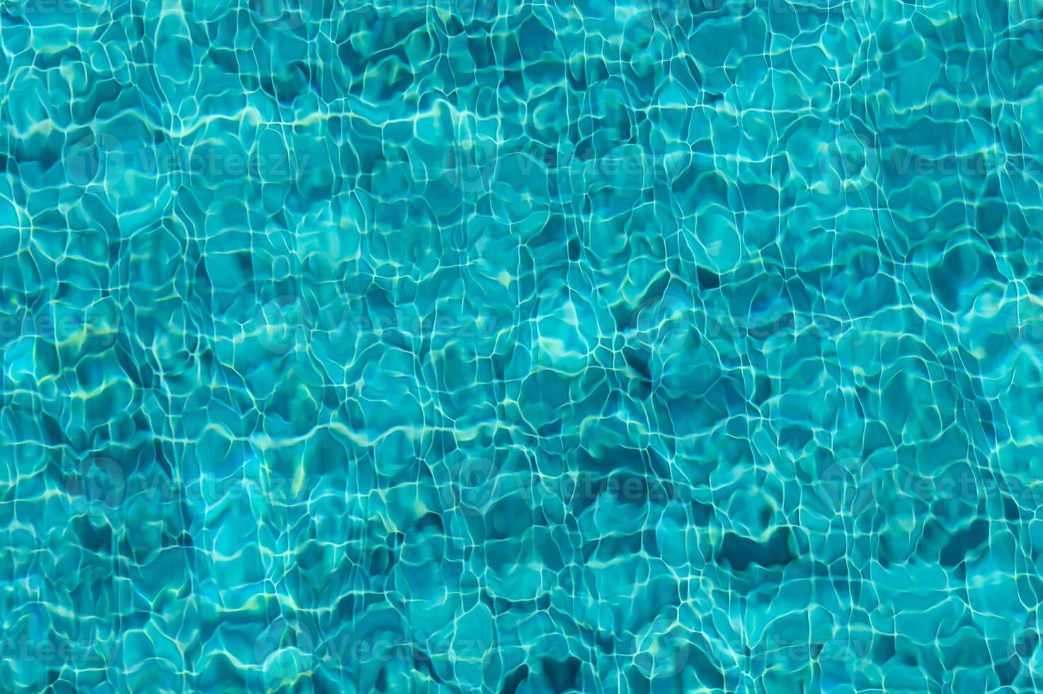 The Shimmering Turquoise Surface of a Tranquil Pool Reflecting Sunlight and Creating Mesmerizing Patterns photo