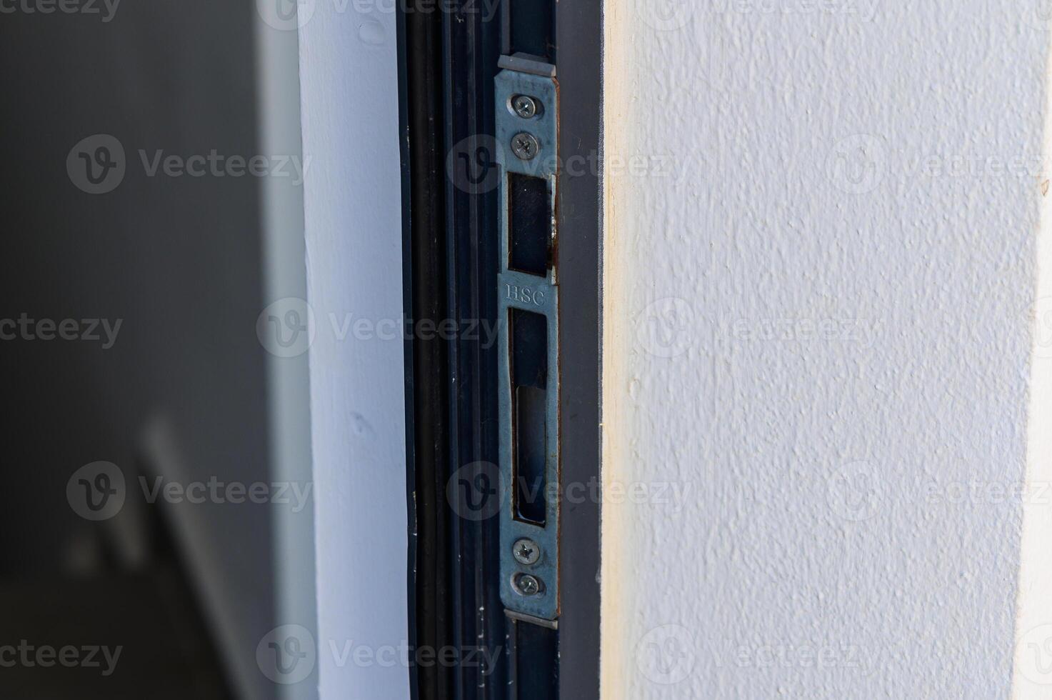 A Close-Up View of an Installed Door Lock Mechanism Showcasing Precision Craftsmanship in a Modern Home photo