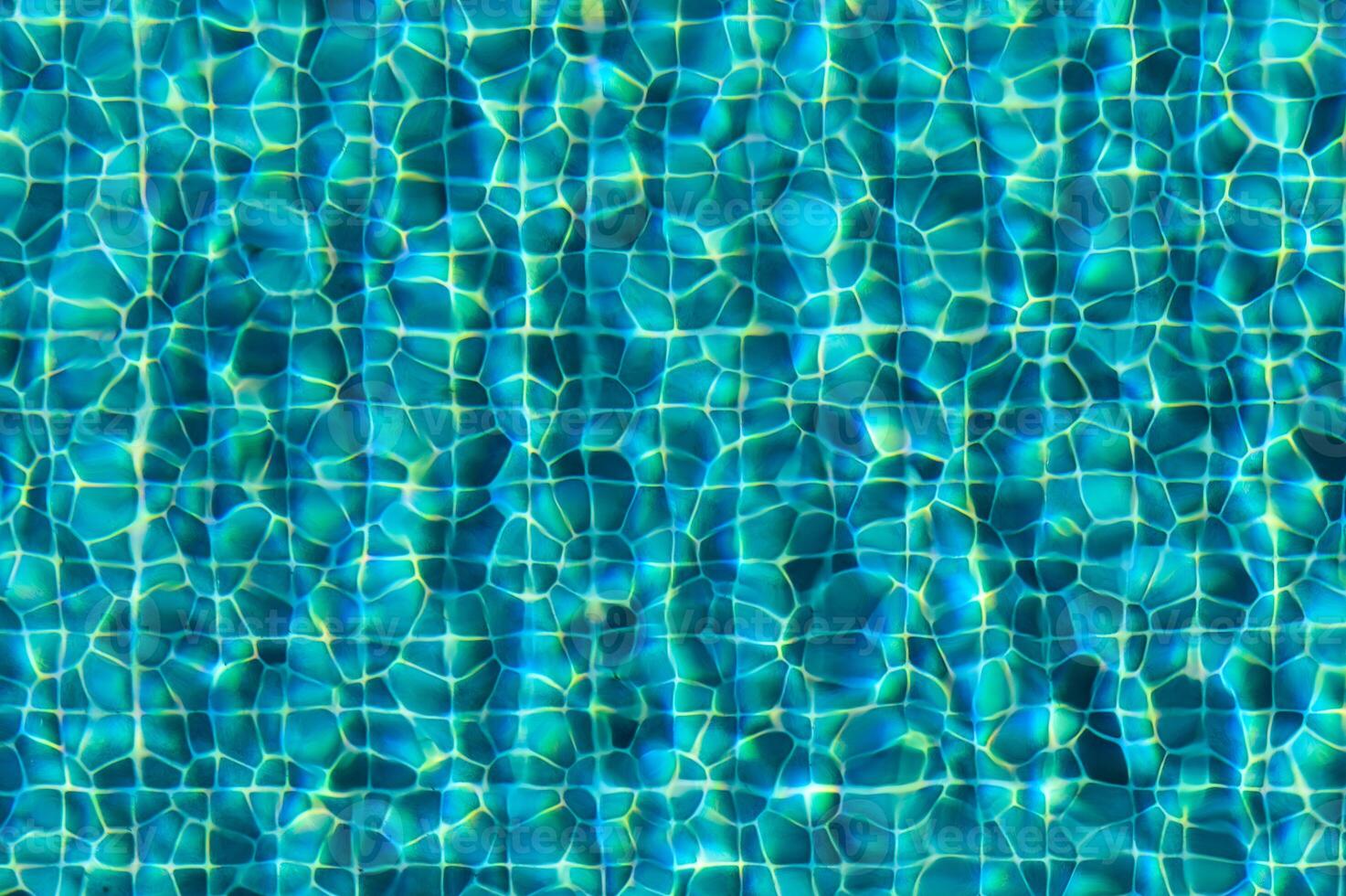 Rippling Waters Under Sunlight Create Mesmerizing Patterns in a Tranquil Swimming Pool on a Bright Summer Day photo