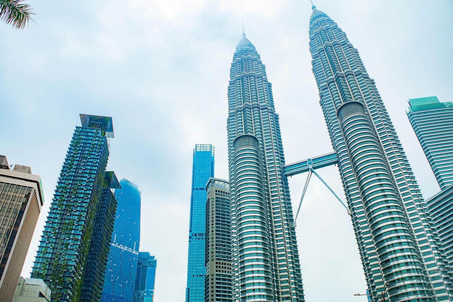 Petronas twin Towers with clouds. photo
