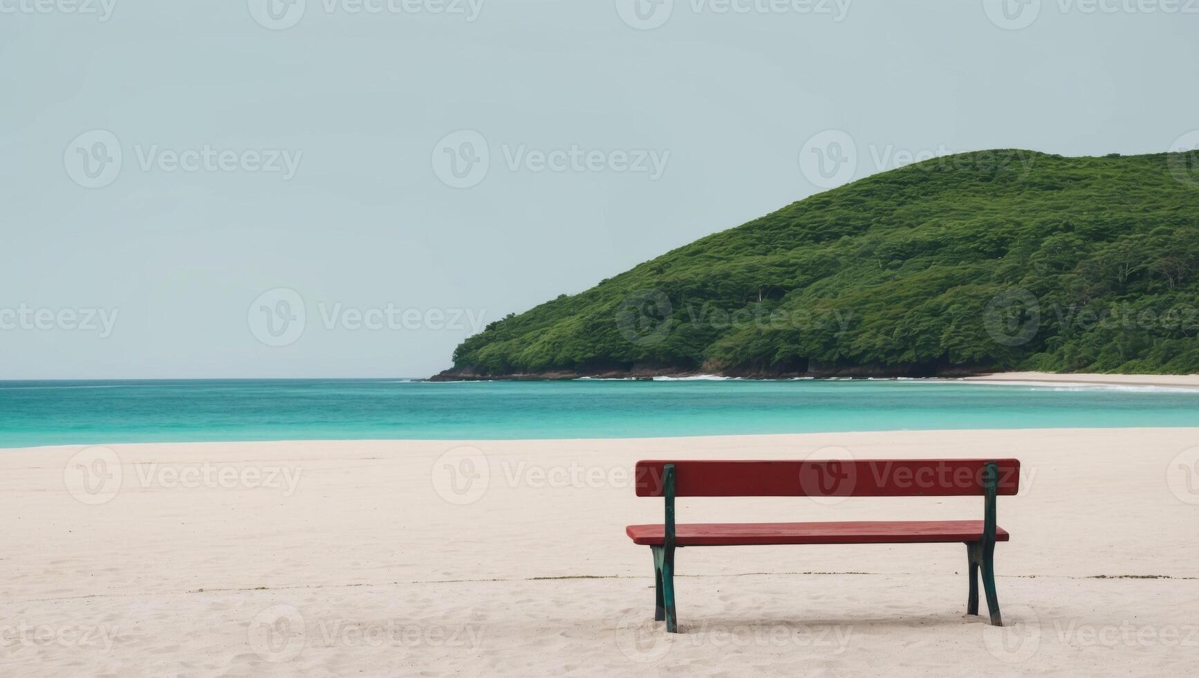 A red bench sitting on the beach near the ocean photo