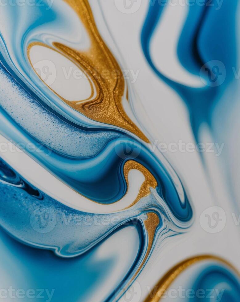 A blue and gold swirl on a white surface photo