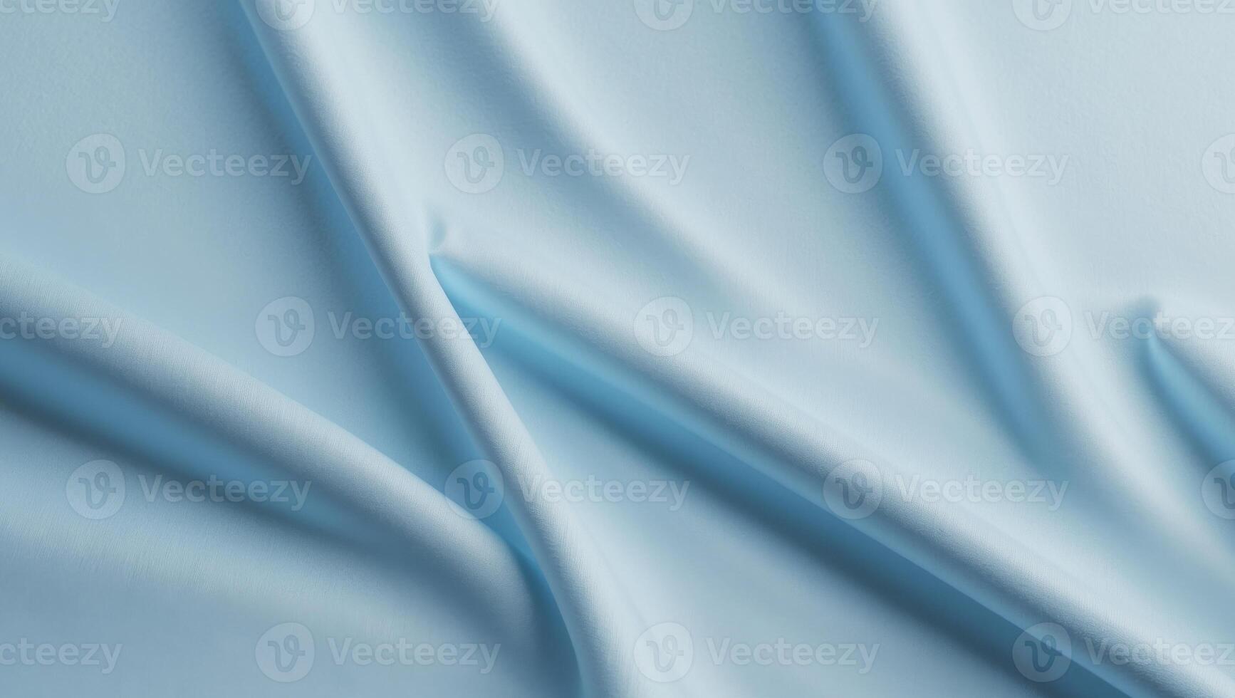 Light blue satin fabric with folds photo
