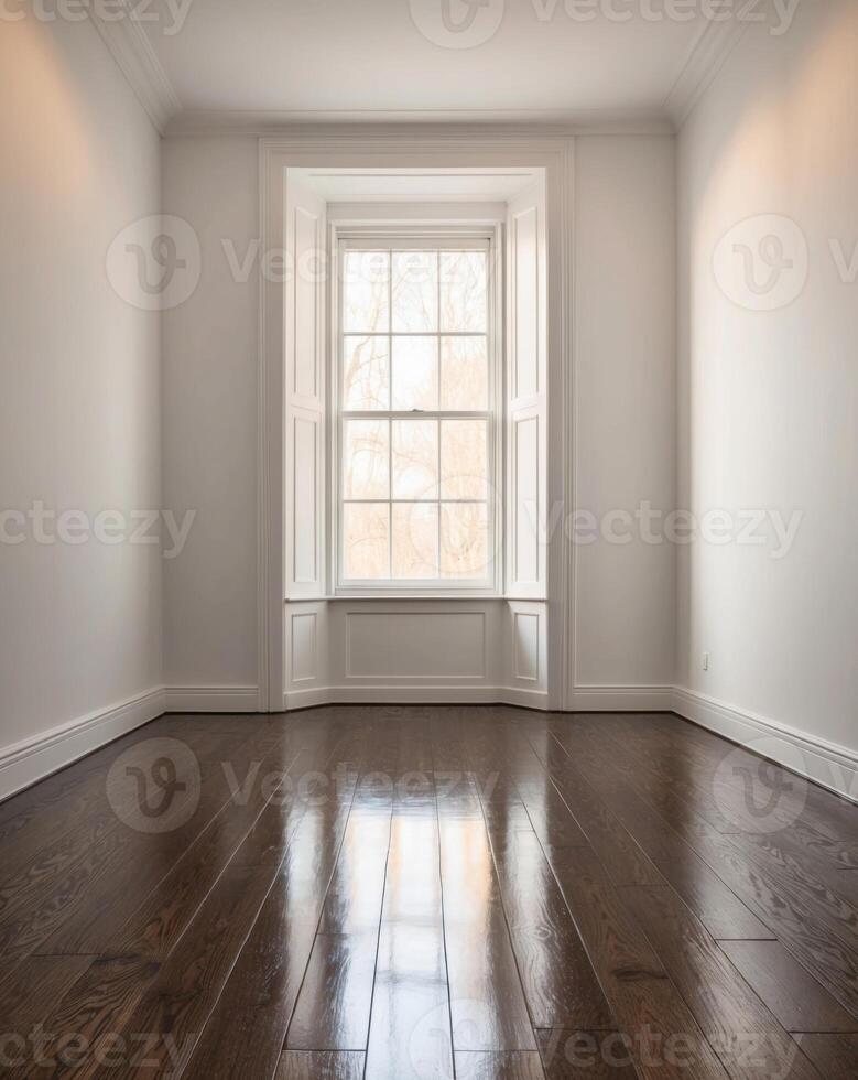 Empty room with hardwood floors and a window photo