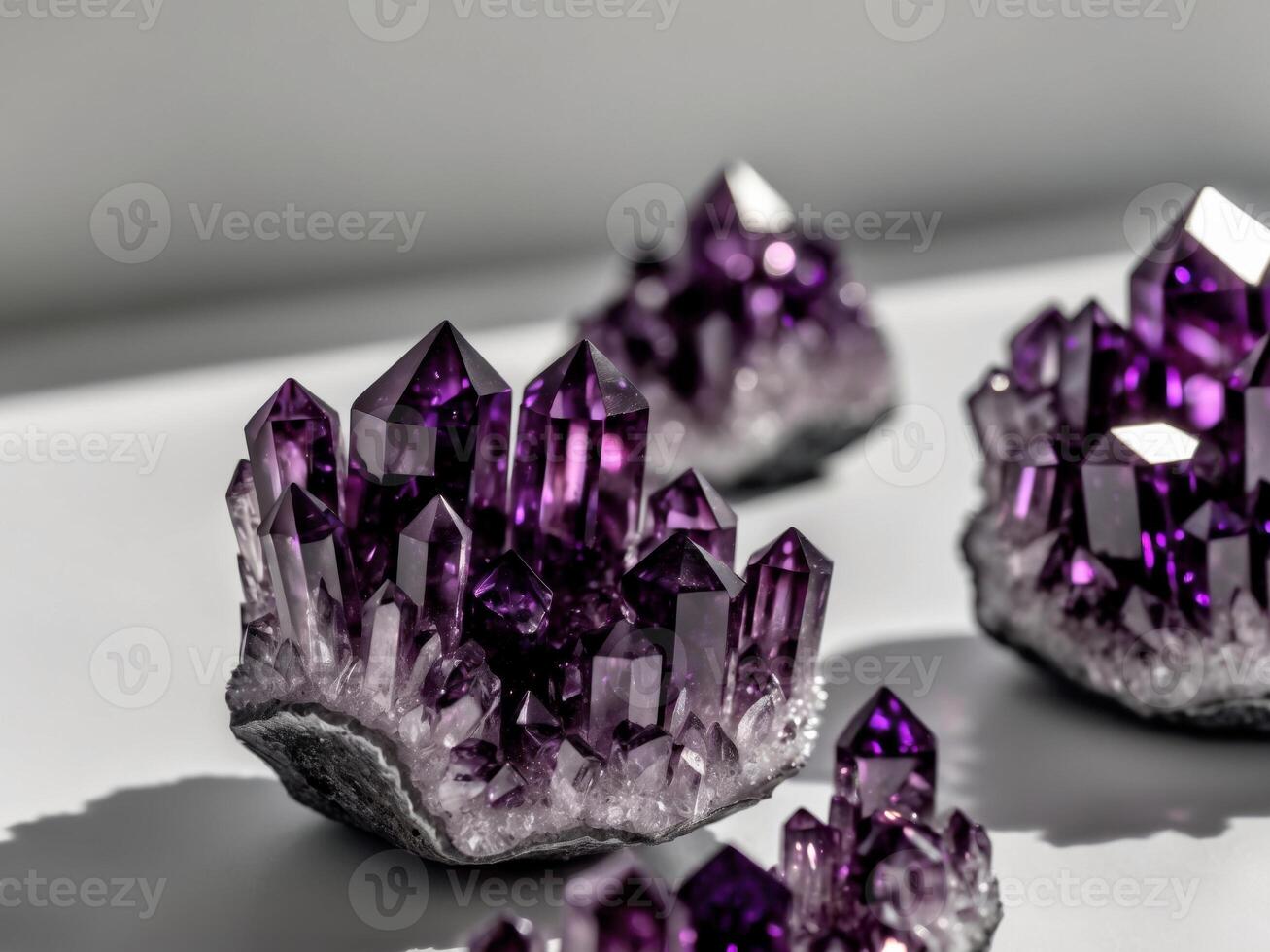 Amethyst crystals on white background photo