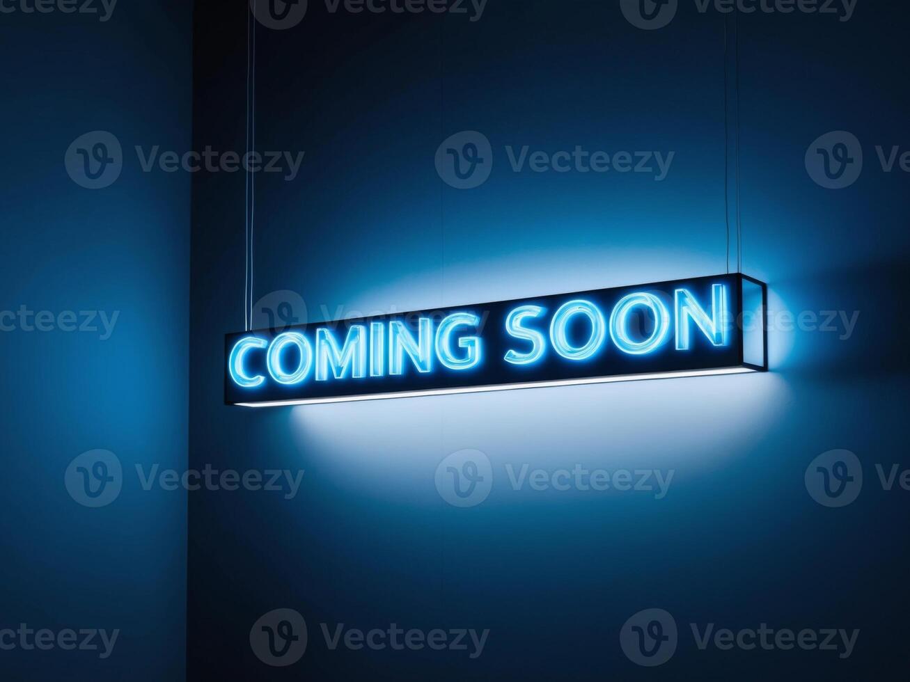 A neon sign that says coming soon photo
