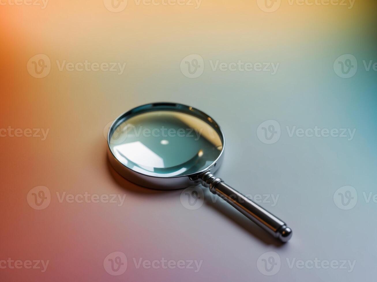 A magnifying glass on a table with a blurred background photo