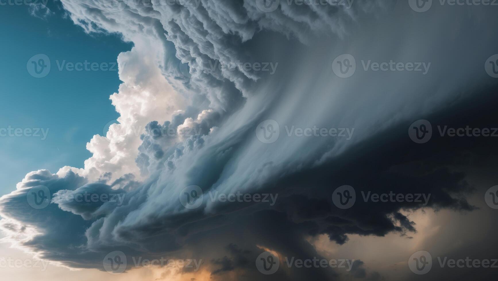 A large storm cloud is seen in the sky photo