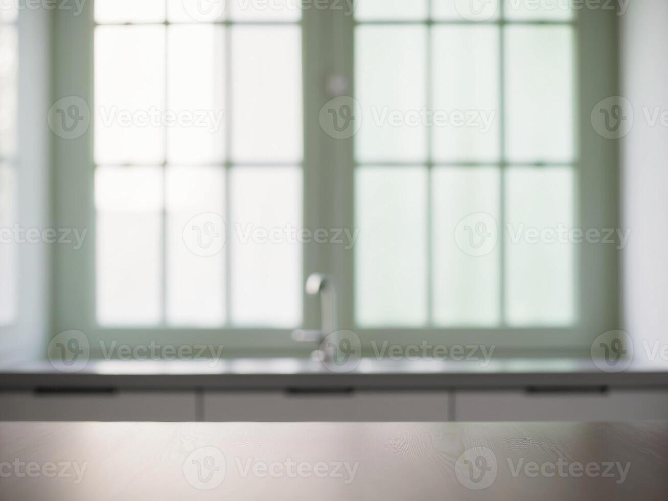 A table in front of a window with a sink photo