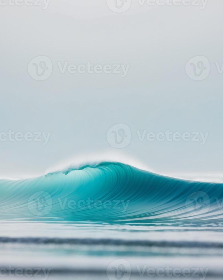 A wave is breaking on the ocean photo