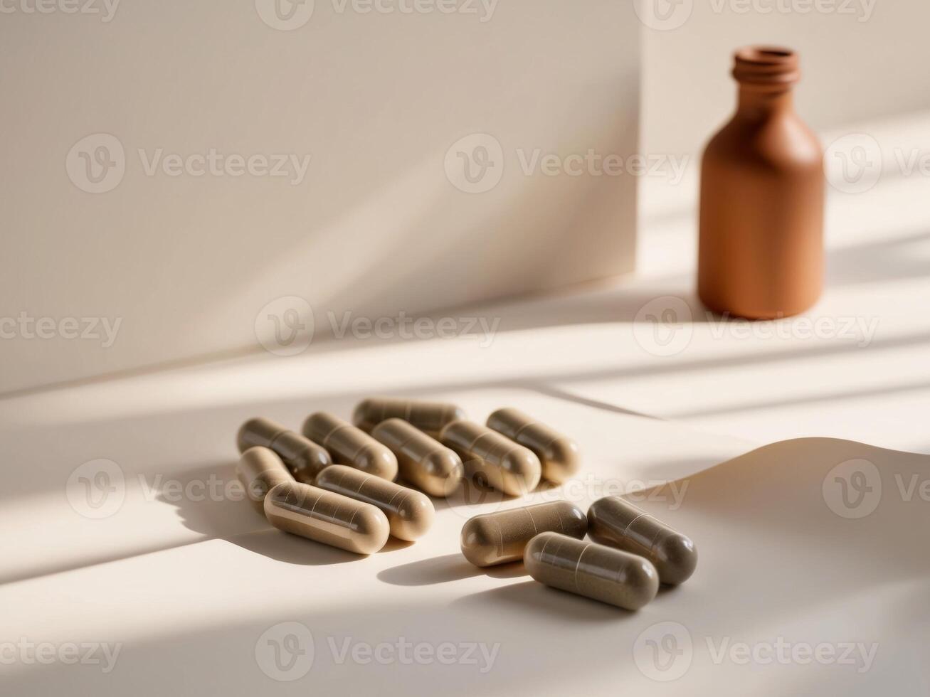 A bottle of pills and capsules on a table photo