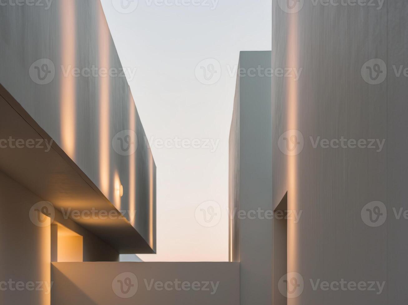A white building with a light shining on it photo