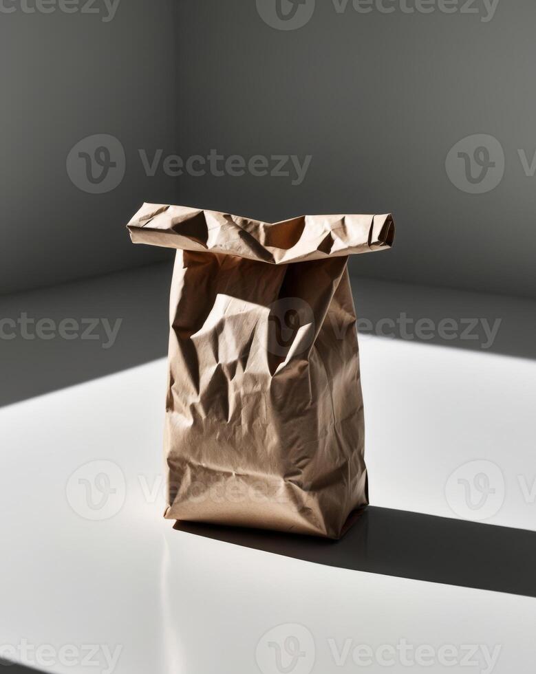 A brown paper bag sitting on a table photo