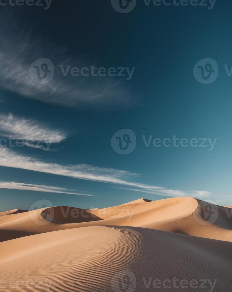 A desert with sand dunes and clouds photo