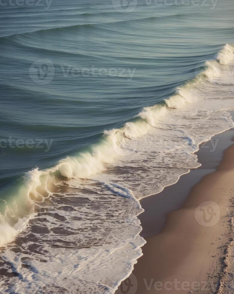 A beach with waves and sand photo