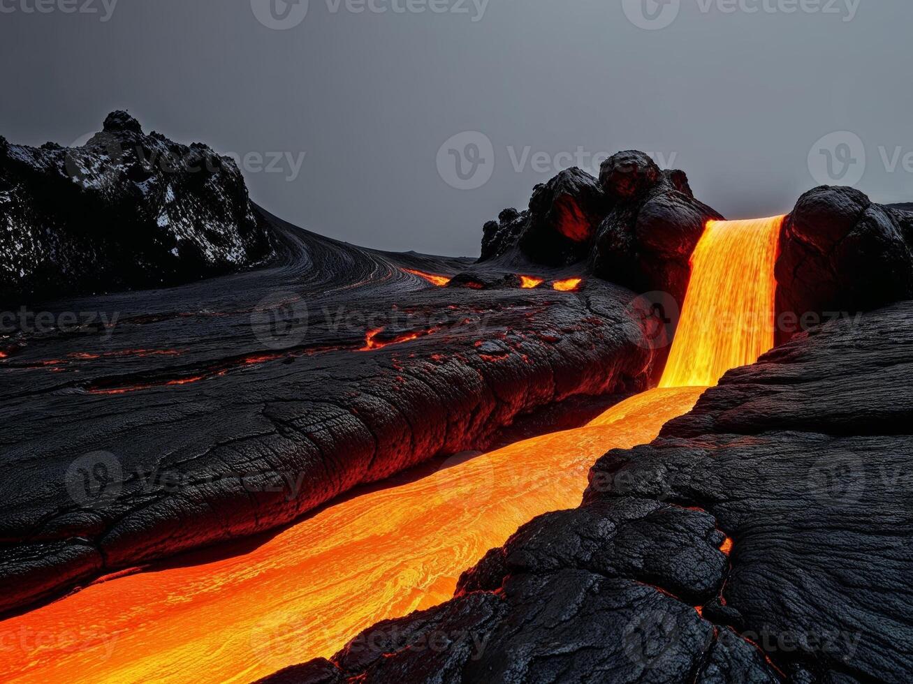 A lava flow is flowing into the ocean photo