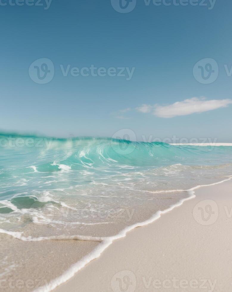 A beach with waves and a blue sky photo
