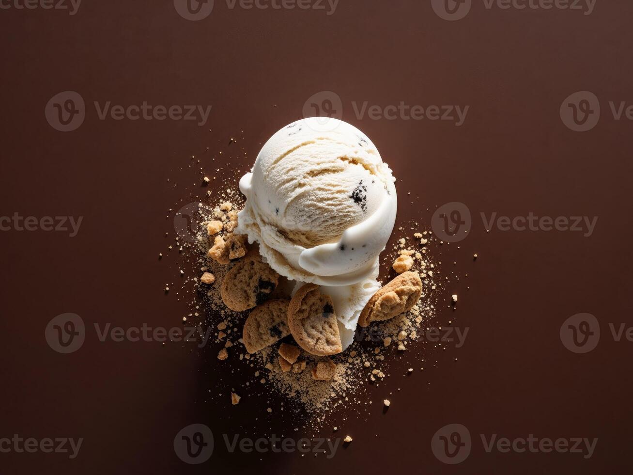 An ice cream cone with cookies and cream on top photo
