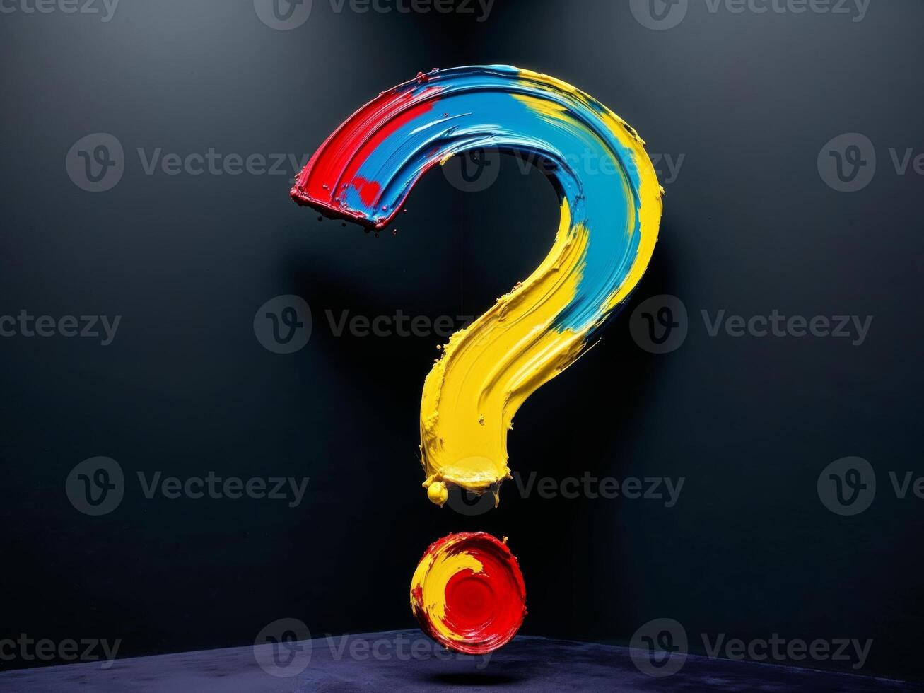 A question mark painted on a wall photo