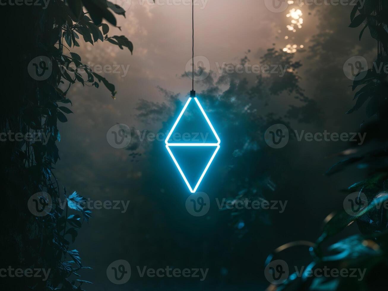 A neon triangle hanging from a tree in the dark photo