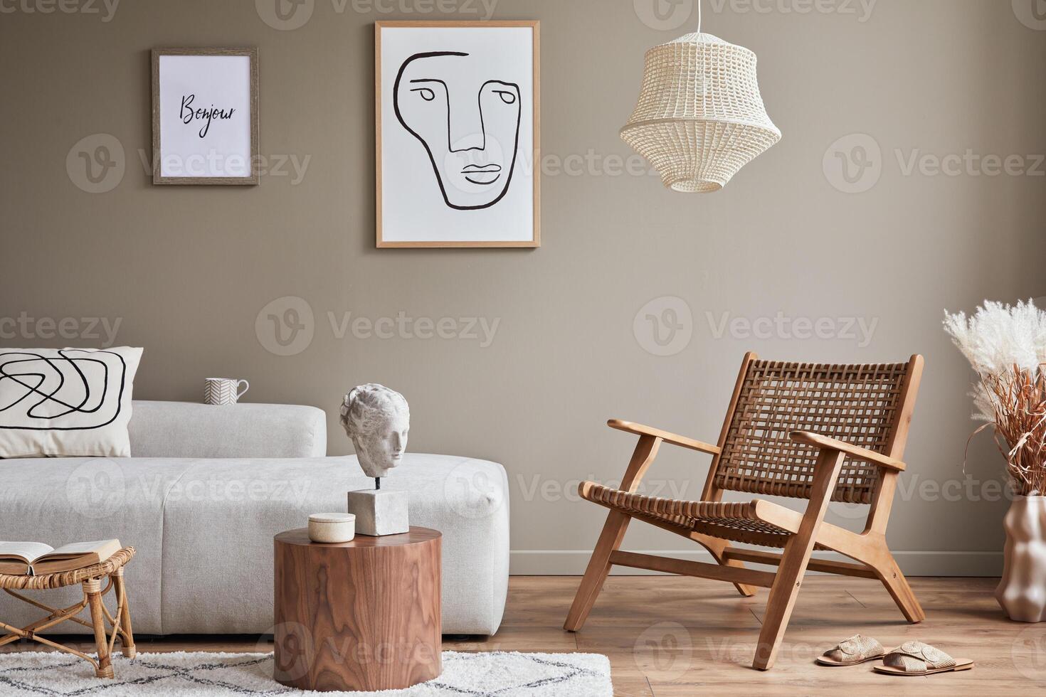 Modern concept of living room interior with design modular sofa, armchair, dried flowers in vase, coffee table, decoration and elegant personal accessories in stylish home decor. photo