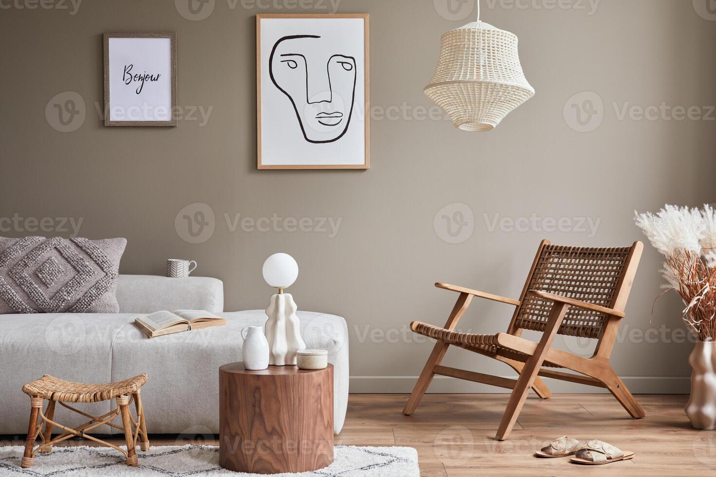 Modern concept of living room interior with design modular sofa, rattan armchair, dried flowers in vase, coffee table, decoration and personal accessories in stylish home decor. photo