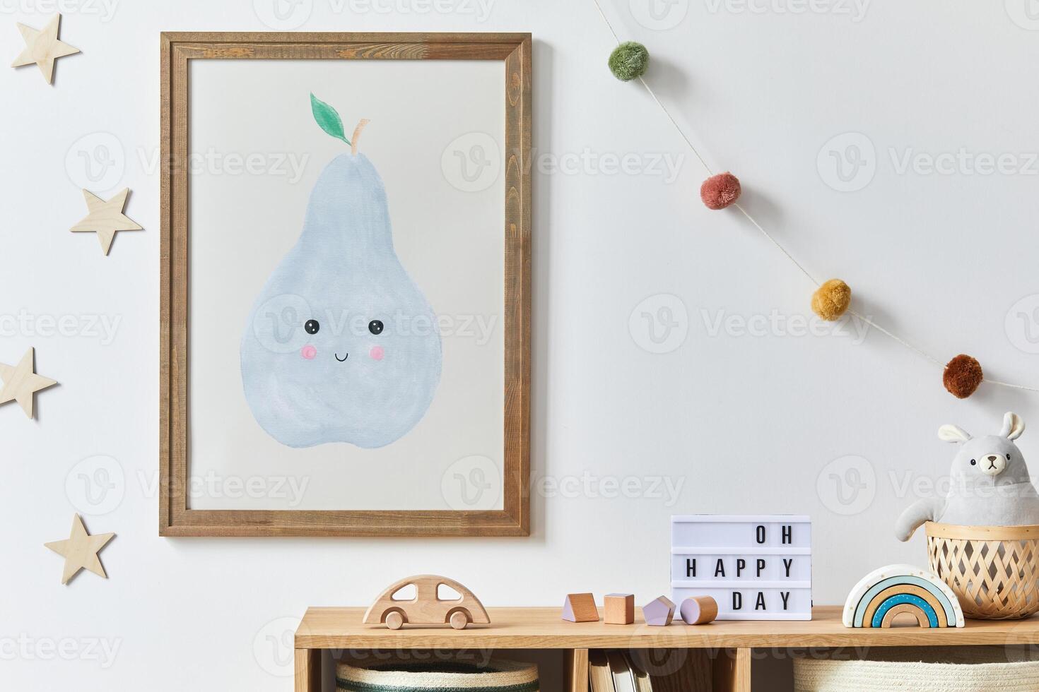 Stylish scandinavian newborn baby room with brown wooden mock up poster frame, toys, plush animal and child accessories. Cozy decoration and hanging cotton flags on the wall photo