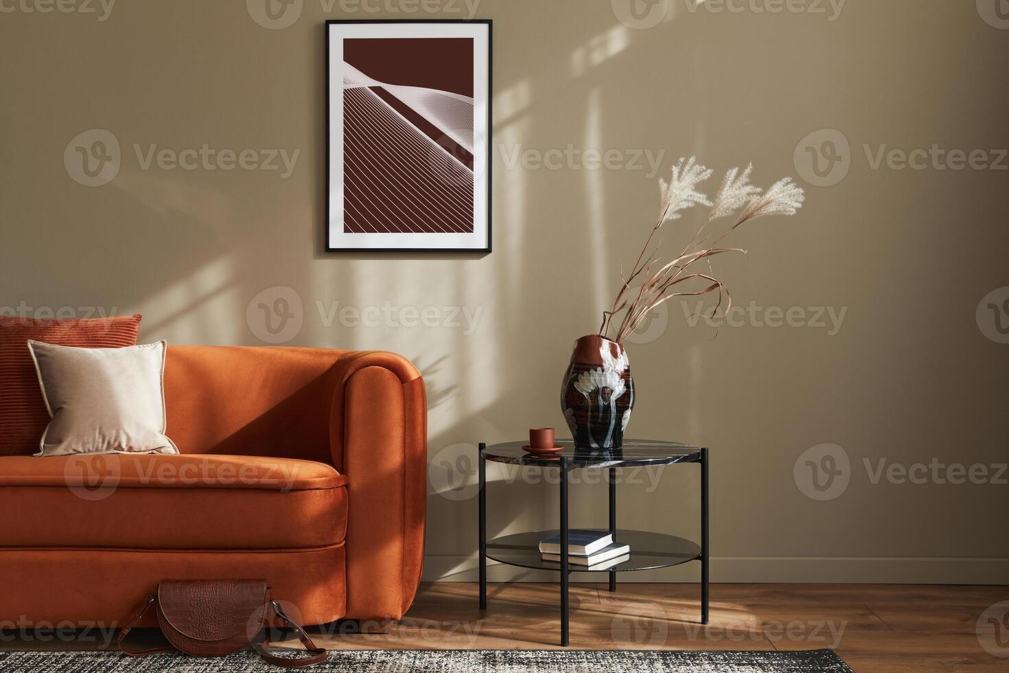 Minimalistic concept of stylish living room interior with design velvet sofa, mock up poster frame, coffee table, pillow, decoration and elegant accessories in modern home decor. Template. photo