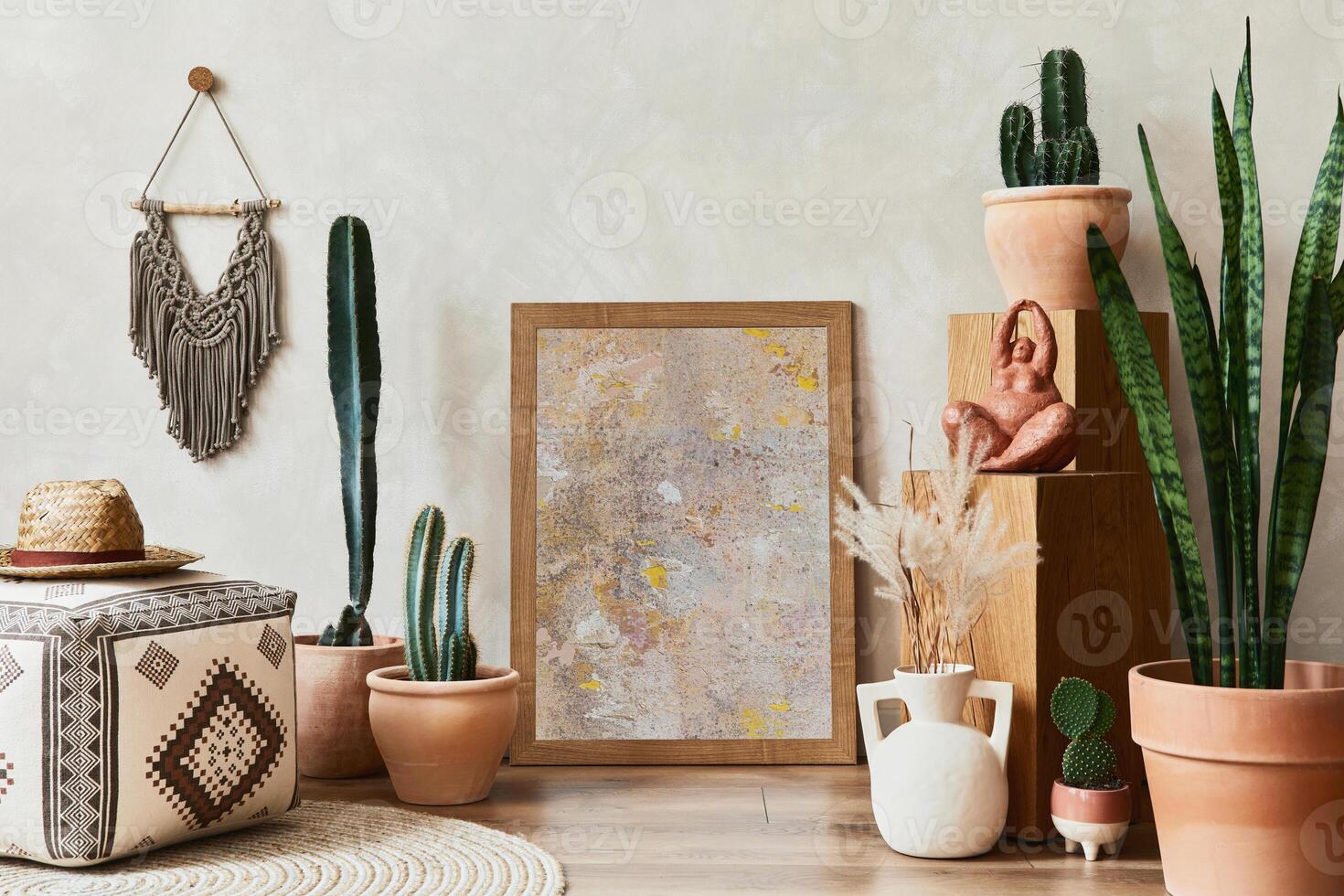 Creative composition of stylish living room interior with mock up poster frame, cacti and personal boho accessories. Plant love and nature concept. Template. photo