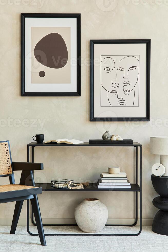 Creative composition of stylish modern living room interior with two mock up poster frames, black commode, armchair, cofee table, lamp and personal accessories. Neutral corols. Template. photo