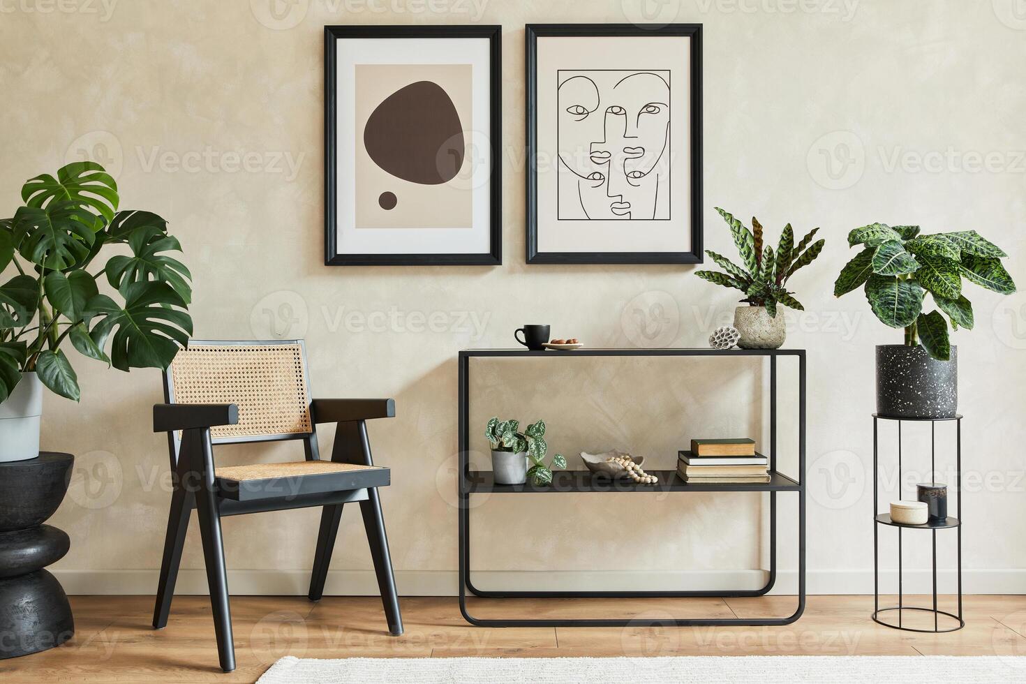 Creative composition of stylish modern living room interior with two mock up poster frames, black geometric commode, armchair, cofee table, lamp and personal accessories. Creative composition photo