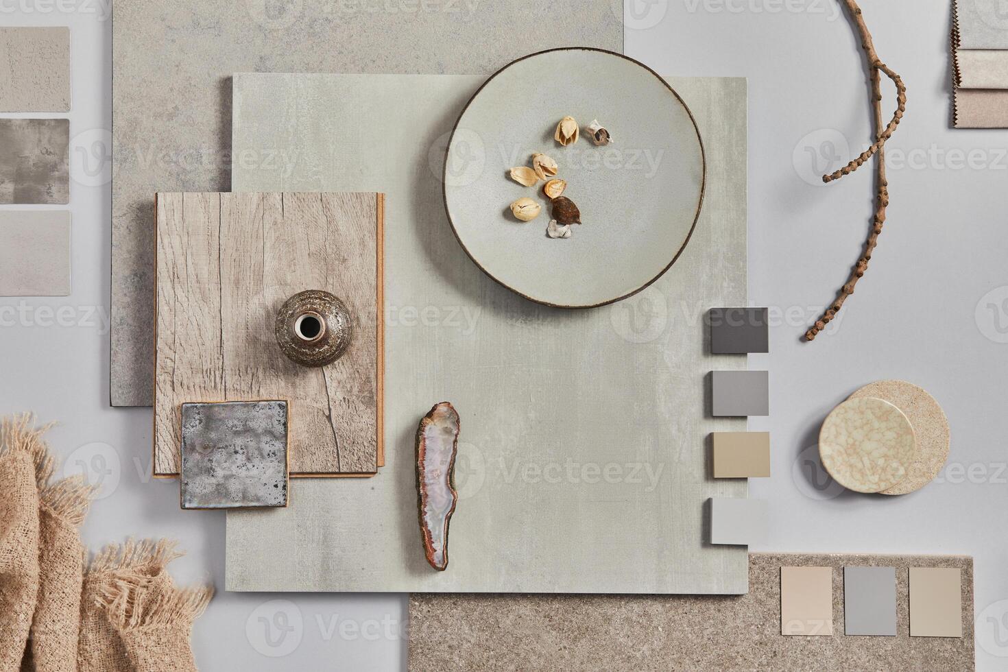 Creative flat lay design of stylish beige architect moodboard composition with samples of building, textile and natural materials and personal accessories. Top view - white background photo