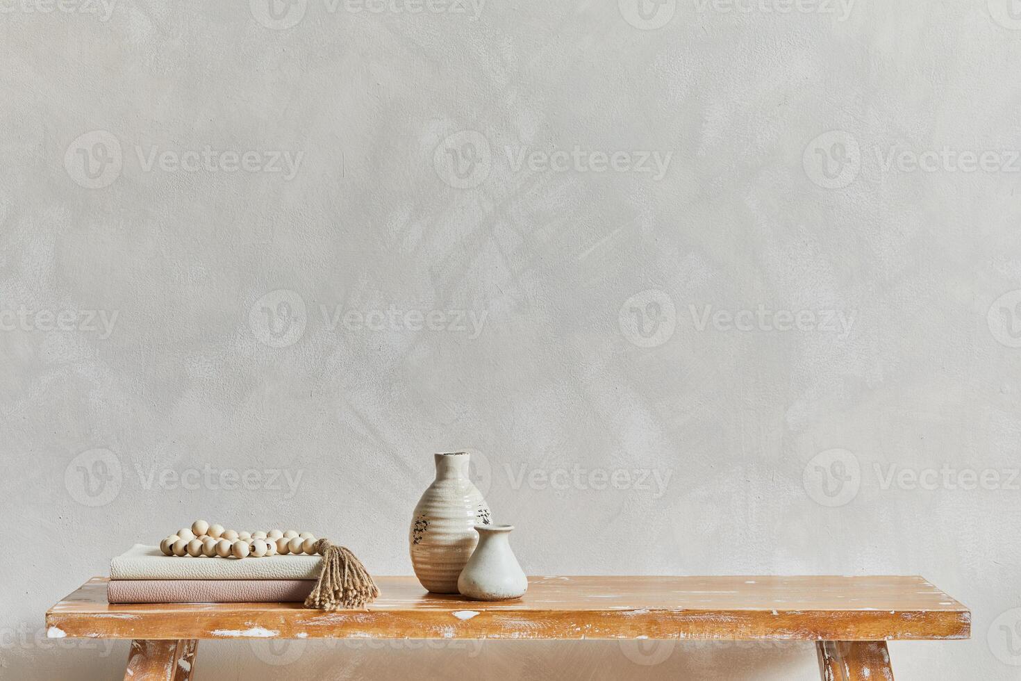 Stylish composition of living room interior with copy space, bench in retro style, clay vases and crockery. Rustic inspiration and Summer vibes. Beige wall. Template. photo